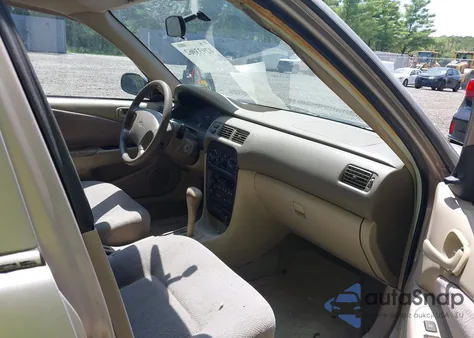 2001 Chevrolet Prizm from USA, damaged, VIN 1Y1SK52831Z434117